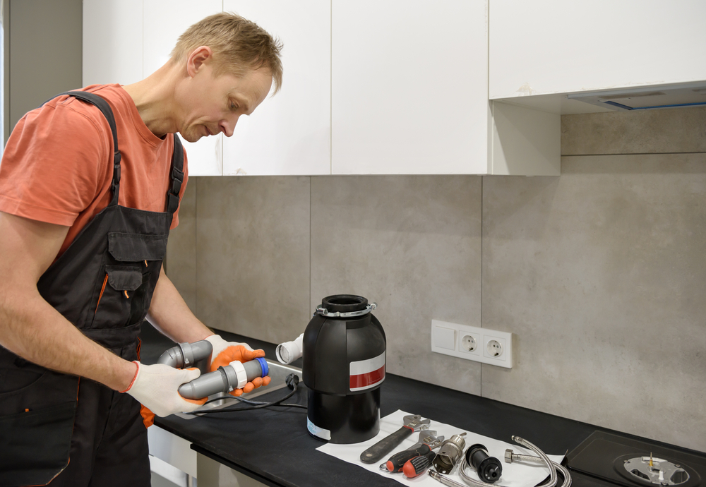 plumber under sink